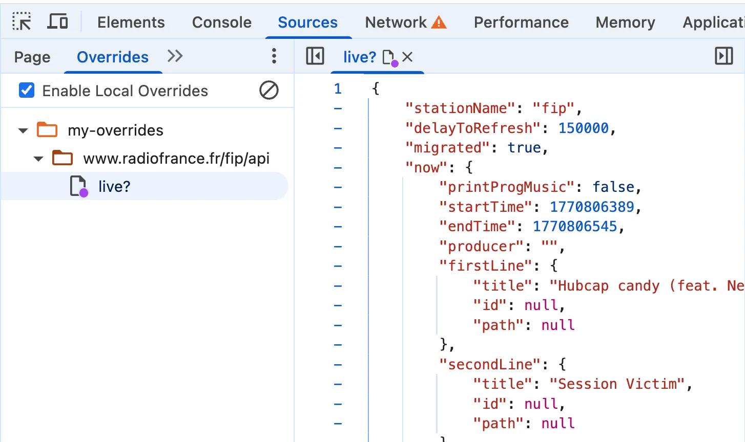 Sources tab of the Chrome devtools with a local override displayed